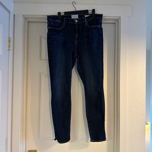 Frame Le High Skinny in dark wash with split ankle hem.